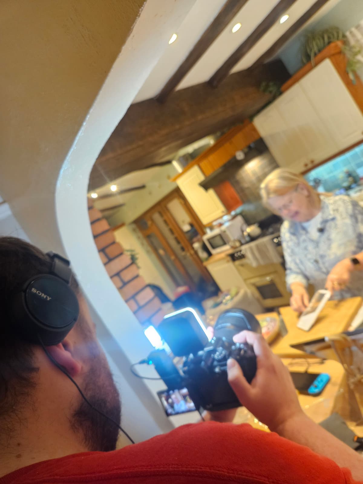 A quiet detail shot that captures a reflective pause during filming.