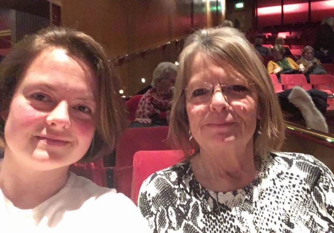 A mother and daughter at the theatre